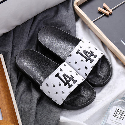 A home slippers indoor anti-slip sandals summer wear casual wear-resistant slippers couple fashion trend female drag.