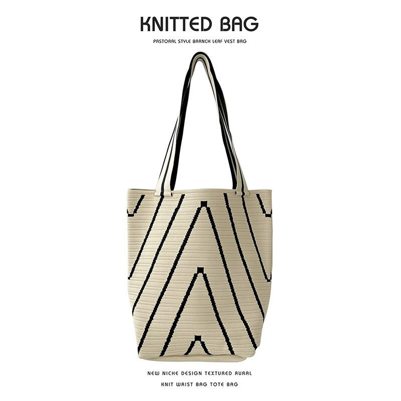 A large-capacity small bag, women's striped portable knitted tote bag, portable storage bag, Korean version solid color shoulder bag.