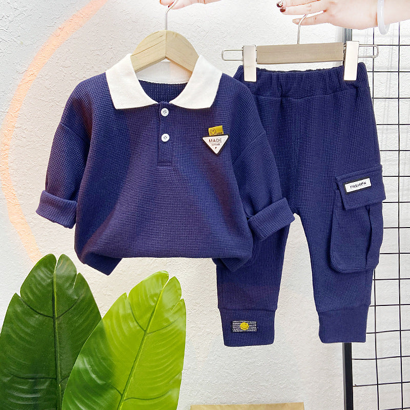 A children's clothing spring new baby boy solid color casual foreign style two buckles lapel long sleeve two-piece set wholesale