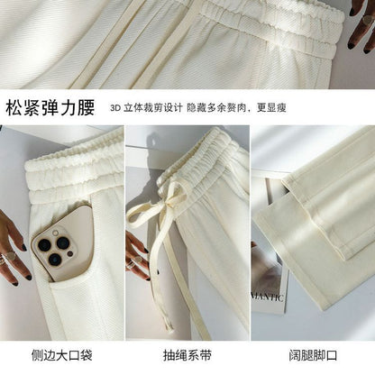 A white wide-leg pants women's summer 2024 new small vertical straight casual narrow version high-waisted sports banana pants