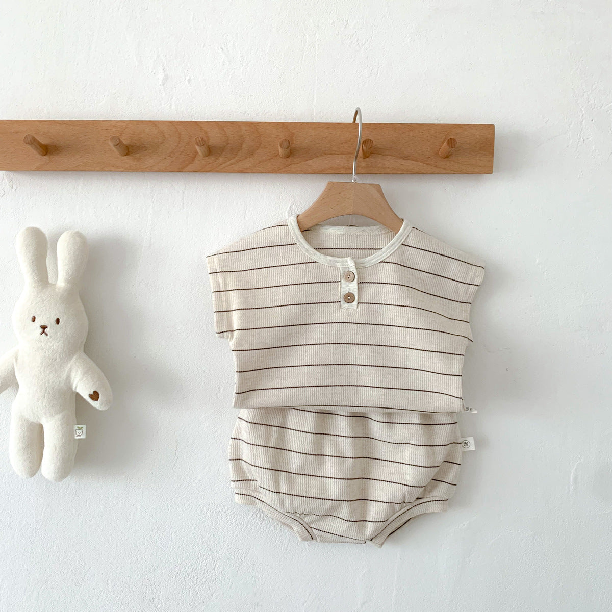 Un conjunto de ropa para niños INS Baby Stripe Waffle Set de pantalones cortos de manga corta de verano para hombres y mujeres 