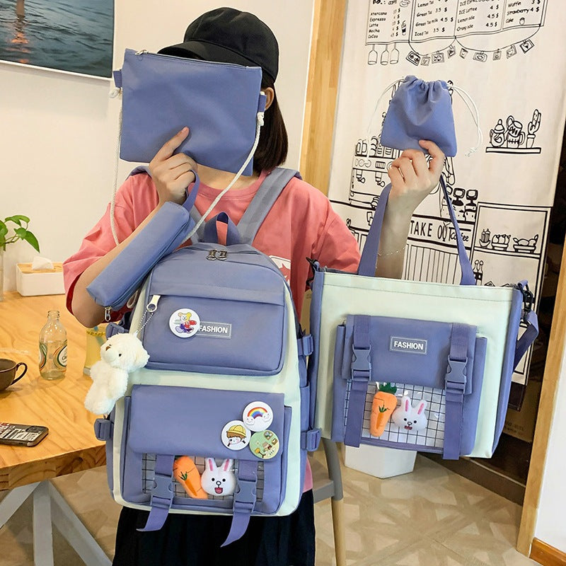 Un nuevo tipo de mochila para estudiantes de primaria en los grados 3 a 5 y 6, versión coreana para mujeres, conjunto de cinco piezas de gran capacidad, mochila para niños, mochila, mochila 