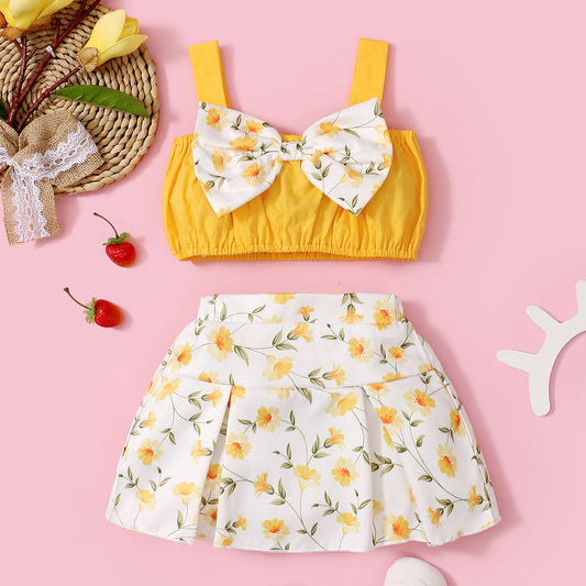 Two piece set of girls' summer, summer, European and American fashion bow strap top and floral short skirt