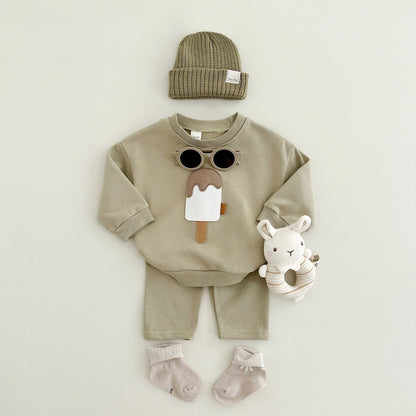 A two-piece set of cute ice cream for boys and girls, new long-sleeved trousers, baby set, casual sportswear, autumn and winter models