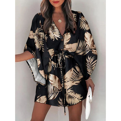 A cross-border European and American foreign trade women's clothing summer women's flying sleeves Amazon V-neck lace up printed beach skirts wholesale