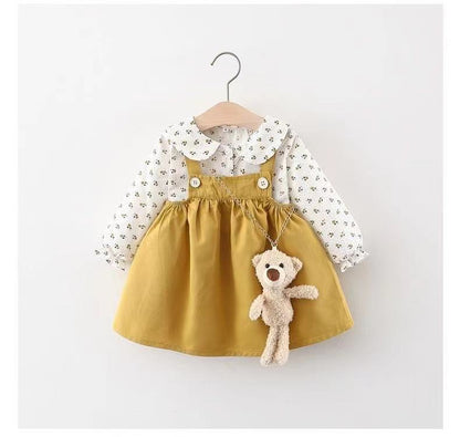 Wholesale of children's clothing for girls, floral shirt top with teddy bear strap skirt, autumn new two-piece set A421