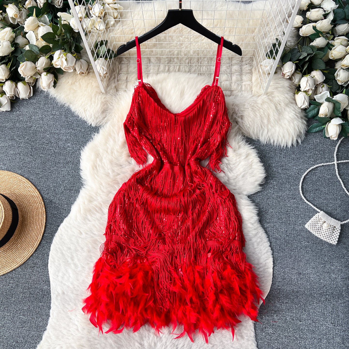 A feather splicing sequined dress women's European and American ins high-end dress sexy halter waist suspender fringed skirt