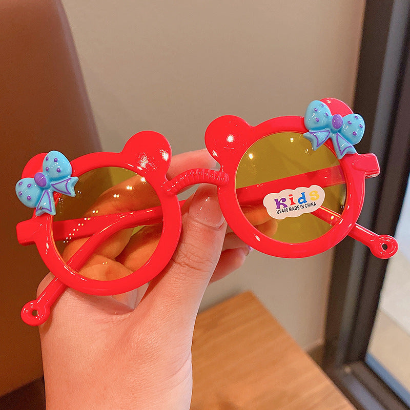 A Mickey children's sunglasses and sunglasses wholesale children's bow cartoon cute girl sun protection sunglasses factory 0.02KG