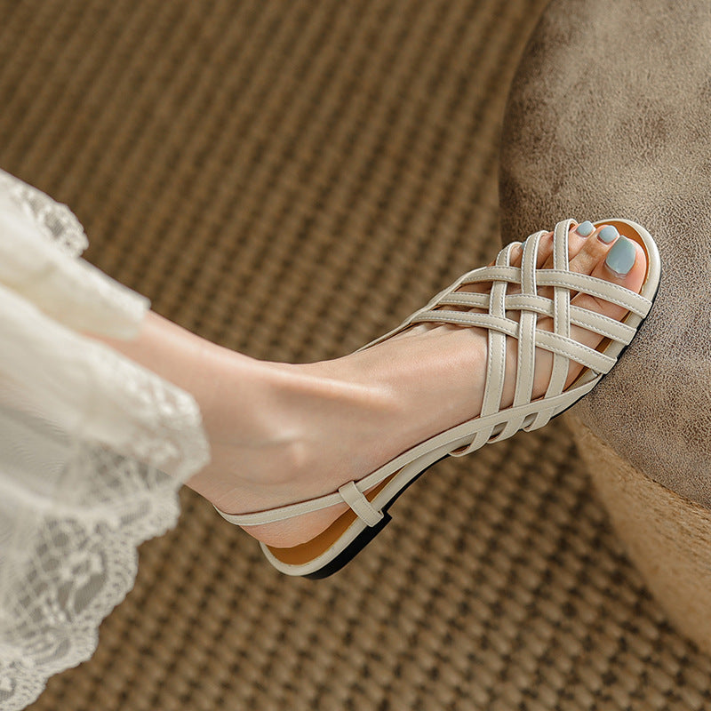 A Roman woven sandals for women in 2024, new summer fashion with flat bottomed French vintage low heel hollow out sandals