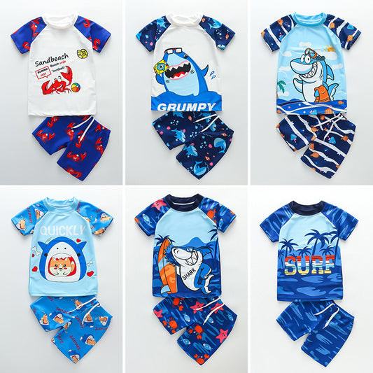 A 2023 new children&#039;s swimsuit 3-9 years old split boy two-piece swimsuit shark holiday swimsuit wholesale 0.27KG