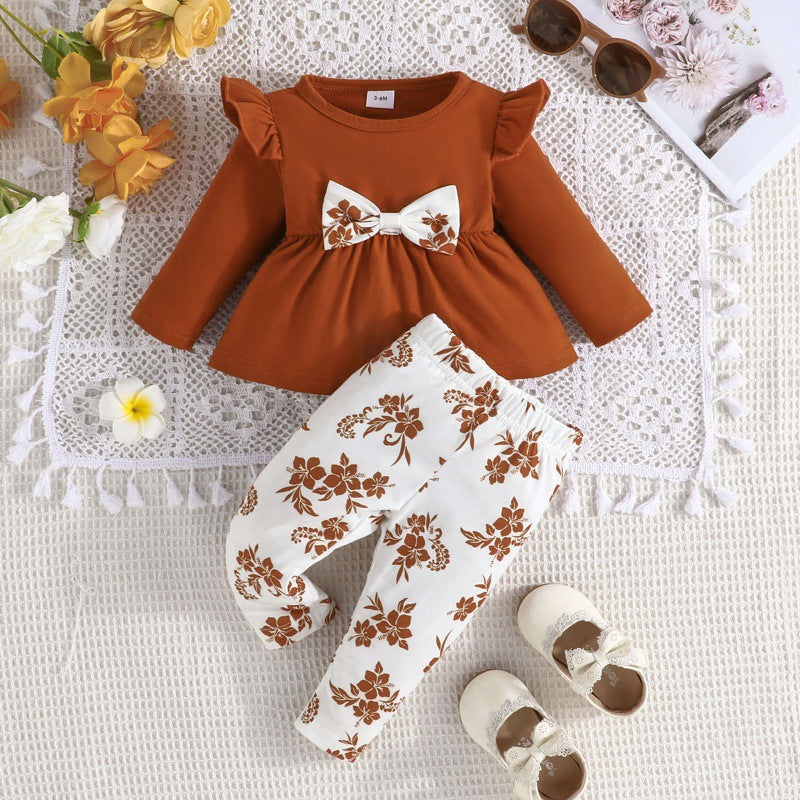 Conjunto de estampado de color sólido de moda para niñas, falda de encaje de manga larga de primavera y otoño para niñas pequeñas con borde cruzado + pantalones de flores 0,15 kg 