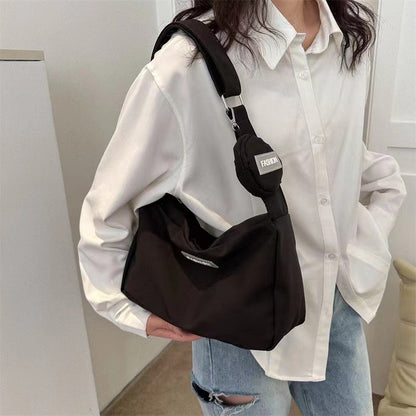 A 2024 New Crossbody Bag Student Classroom Bag Women's Instagram Wind Series Large Capacity Solid Color Mother and Child Bag Single Shoulder Bag