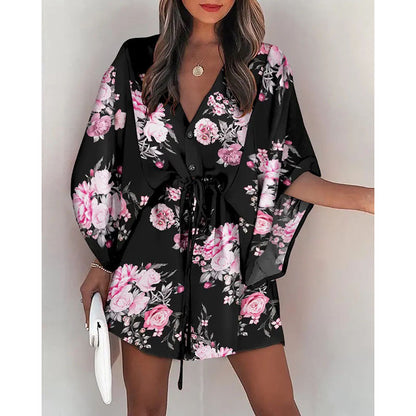 A cross-border European and American foreign trade women's clothing summer women's flying sleeves Amazon V-neck lace up printed beach skirts wholesale