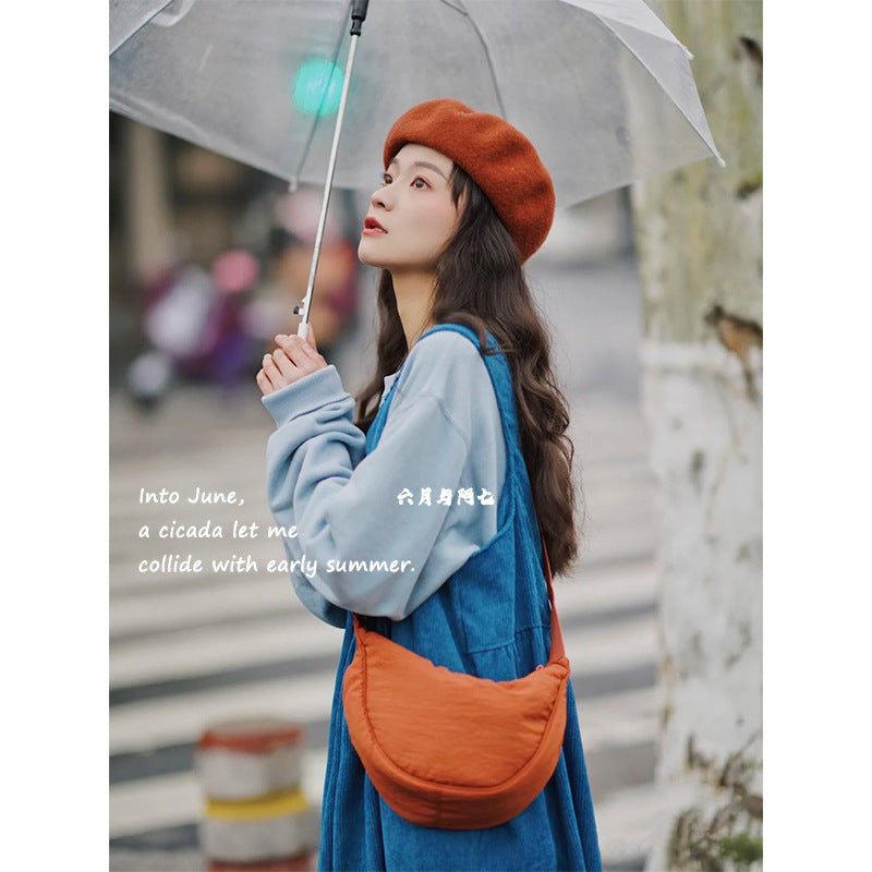 A Youjia fitting room with the same female messenger bag Xiaohongshu nylon dumpling bag student shoulder bag cloth bag factory supply