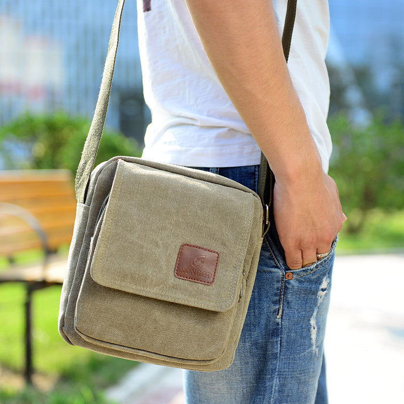 A men's bag messenger bag premium canvas bag business commuter retro small square bag casual fashion men's shoulder bag