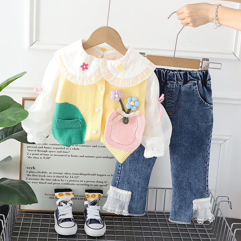 A girl autumn cute suit new spring and autumn clothes Korean version baby girl pocket flower vest three-piece set tide