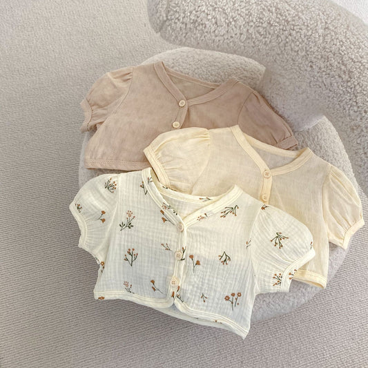 Una nueva chaqueta de manga corta abullonada con estampado floral para bebés y niñas de verano 2024, un cárdigan imprescindible 