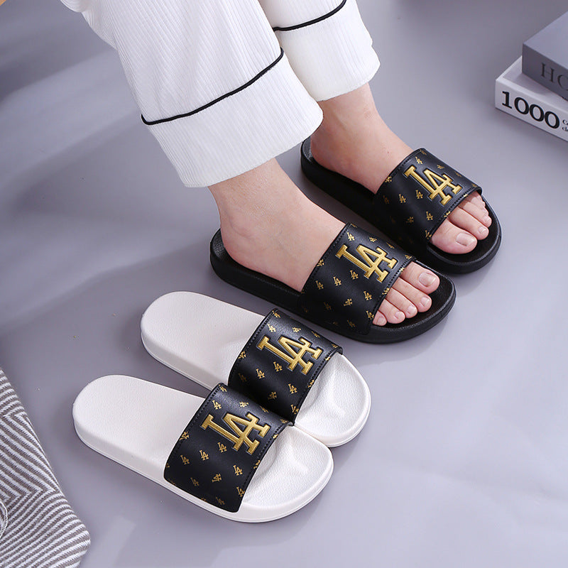 A home slippers indoor anti-slip sandals summer wear casual wear-resistant slippers couple fashion trend female drag.