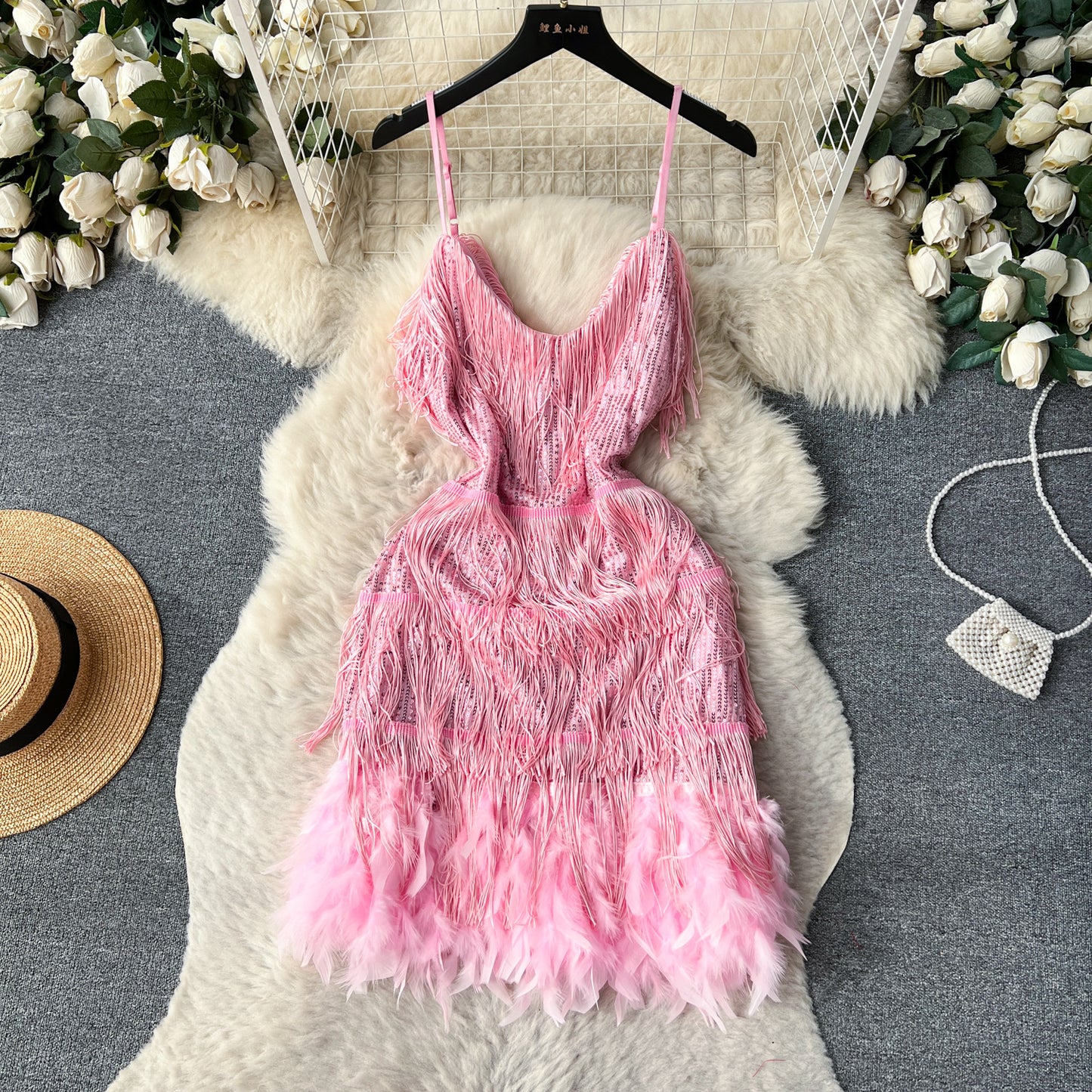 A feather splicing sequined dress women's European and American ins high-end dress sexy halter waist suspender fringed skirt