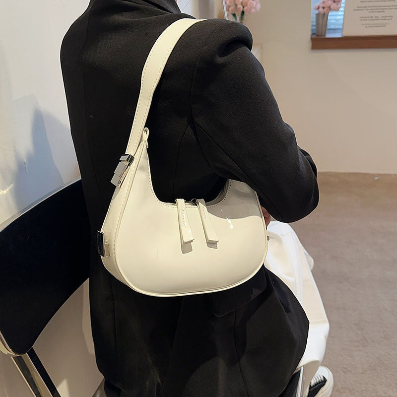 A Korean ins niche design patent leather women's bag 2024 new spring fashion versatile shoulder bag underarm bag tide