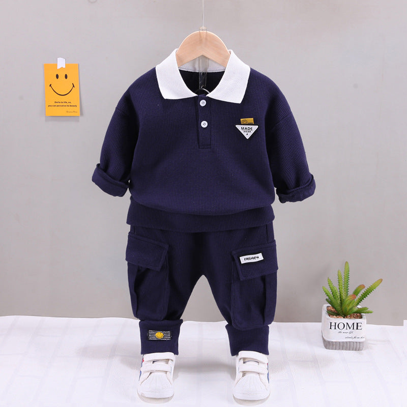 A children's clothing spring new baby boy solid color casual foreign style two buckles lapel long sleeve two-piece set wholesale