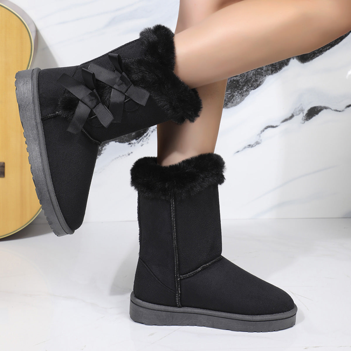 Unas nuevas botas de nieve de mujer de otoño e invierno de tubo mediano, botas medianas y altas, botas de nieve de terciopelo de moda con lazo, comercio exterior transfronterizo 