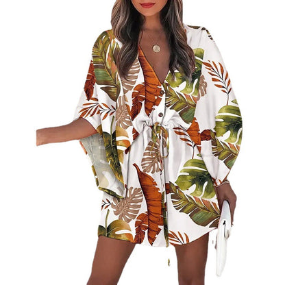 A cross-border European and American foreign trade women's clothing summer women's flying sleeves Amazon V-neck lace up printed beach skirts wholesale