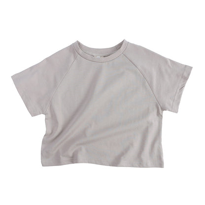 Ropa para niños Camiseta de verano Camiseta de manga corta para niños Camiseta de color caramelo Versión coreana Camiseta holgada de forma ancha para niños y niñas 