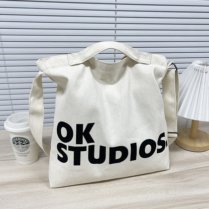 A cross-border canvas bag women's shoulder messenger bag college students in class Japanese literature and art simple large-capacity Korean version cloth bag