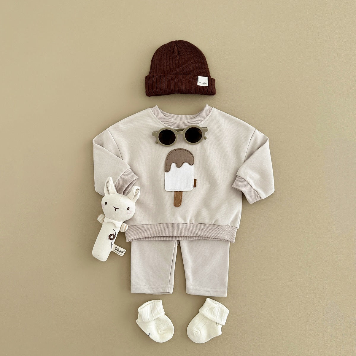 A two-piece set of cute ice cream for boys and girls, new long-sleeved trousers, baby set, casual sportswear, autumn and winter models