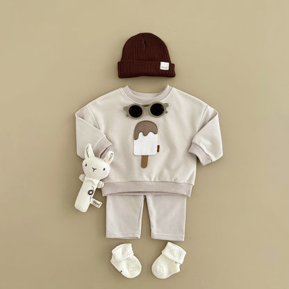 A two-piece set of cute ice cream for boys and girls, new long-sleeved trousers, baby set, casual sportswear, autumn and winter models