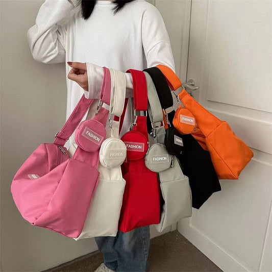 A 2024 New Crossbody Bag Student Classroom Bag Women's Instagram Wind Series Large Capacity Solid Color Mother and Child Bag Single Shoulder Bag