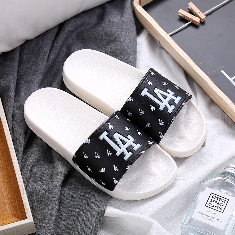 A home slippers indoor anti-slip sandals summer wear casual wear-resistant slippers couple fashion trend female drag.