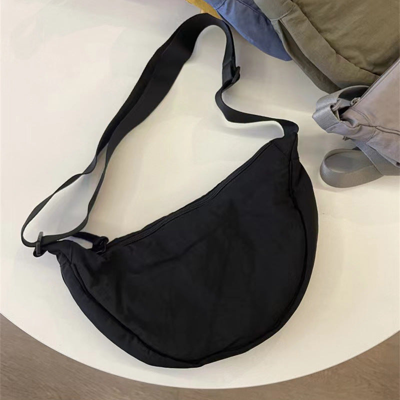 A Youjia fitting room with the same female messenger bag Xiaohongshu nylon dumpling bag student shoulder bag cloth bag factory supply