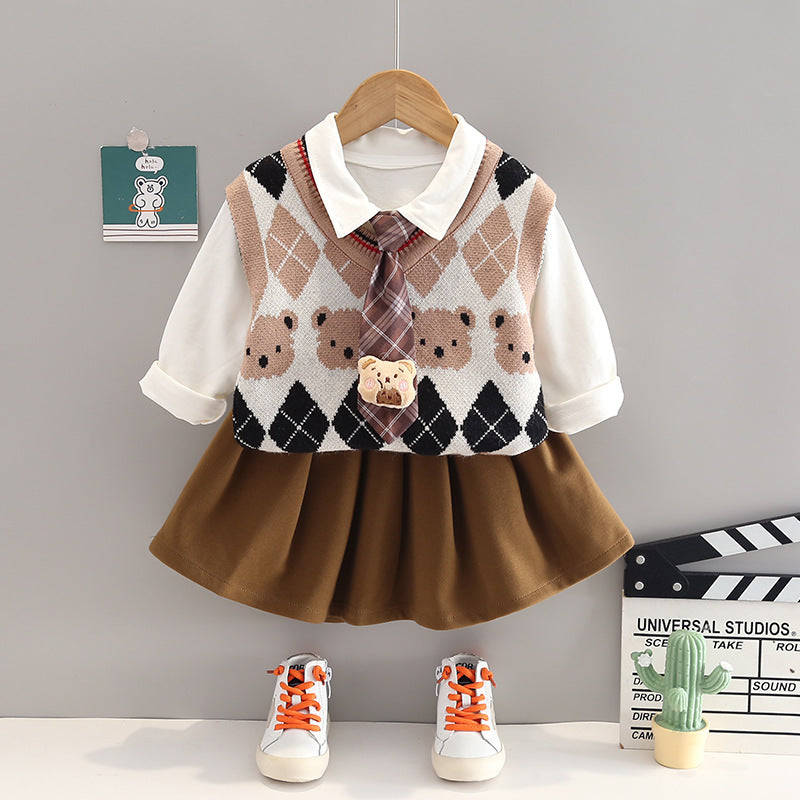 A children's autumn and winter three-piece set manufacturer wholesale boys and girls siblings sweater vest bow tie long-sleeved shirt