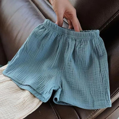 Pantalones cortos para niños, nuevos pantalones elásticos de verano, pantalones sueltos de algodón y cáñamo para niños y niñas, pantalones casuales de estilo occidental para bebés