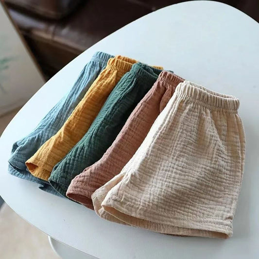 Pantalones cortos para niños, nuevos pantalones elásticos de verano, pantalones sueltos de algodón y cáñamo para niños y niñas, pantalones casuales de estilo occidental para bebés