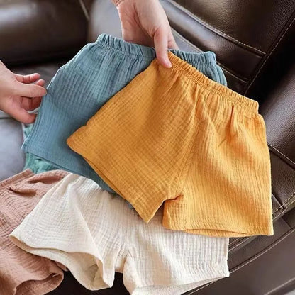 Pantalones cortos para niños, nuevos pantalones elásticos de verano, pantalones sueltos de algodón y cáñamo para niños y niñas, pantalones casuales de estilo occidental para bebés