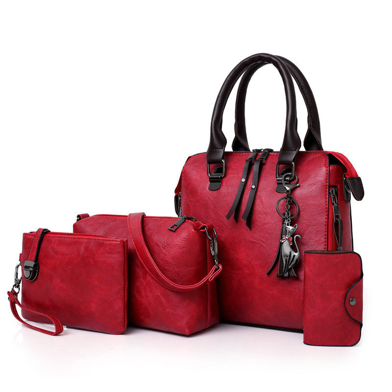 P Luxury Color 2023 Nueva tendencia de moda europea y americana Bolso de madre con asa cruzada en diagonal de un solo hombro Juego de cuatro piezas Bolso de mujer retro de color de contraste 